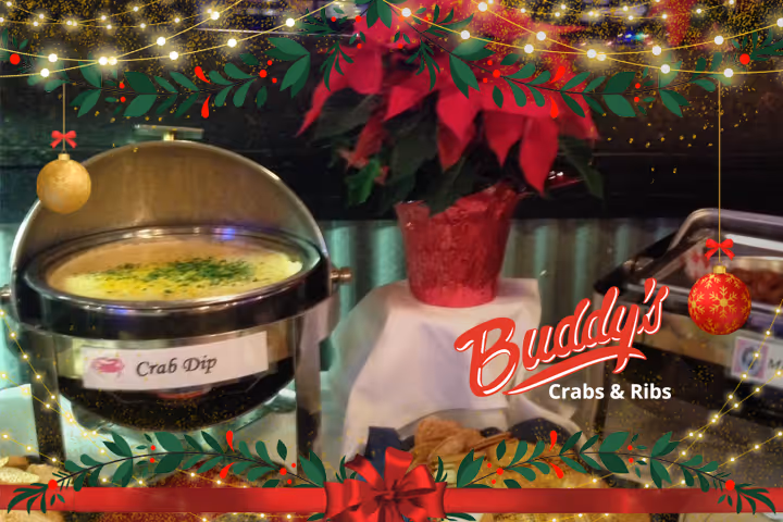 Guests enjoying seafood and waterfront views at Buddy’s Crabs & Ribs in Downtown Annapolis during Memorial Day Weekend, with patriotic decorations and Naval Academy families celebrating nearby.