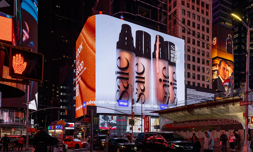 A massive wrap-around screen in Times Square just across the street from the Red Steps.