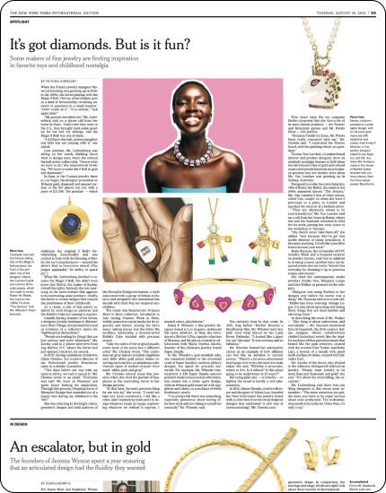 Magazine page discussing jewelry trends with images of diamond necklace, colorful rings, and heart bracelet.