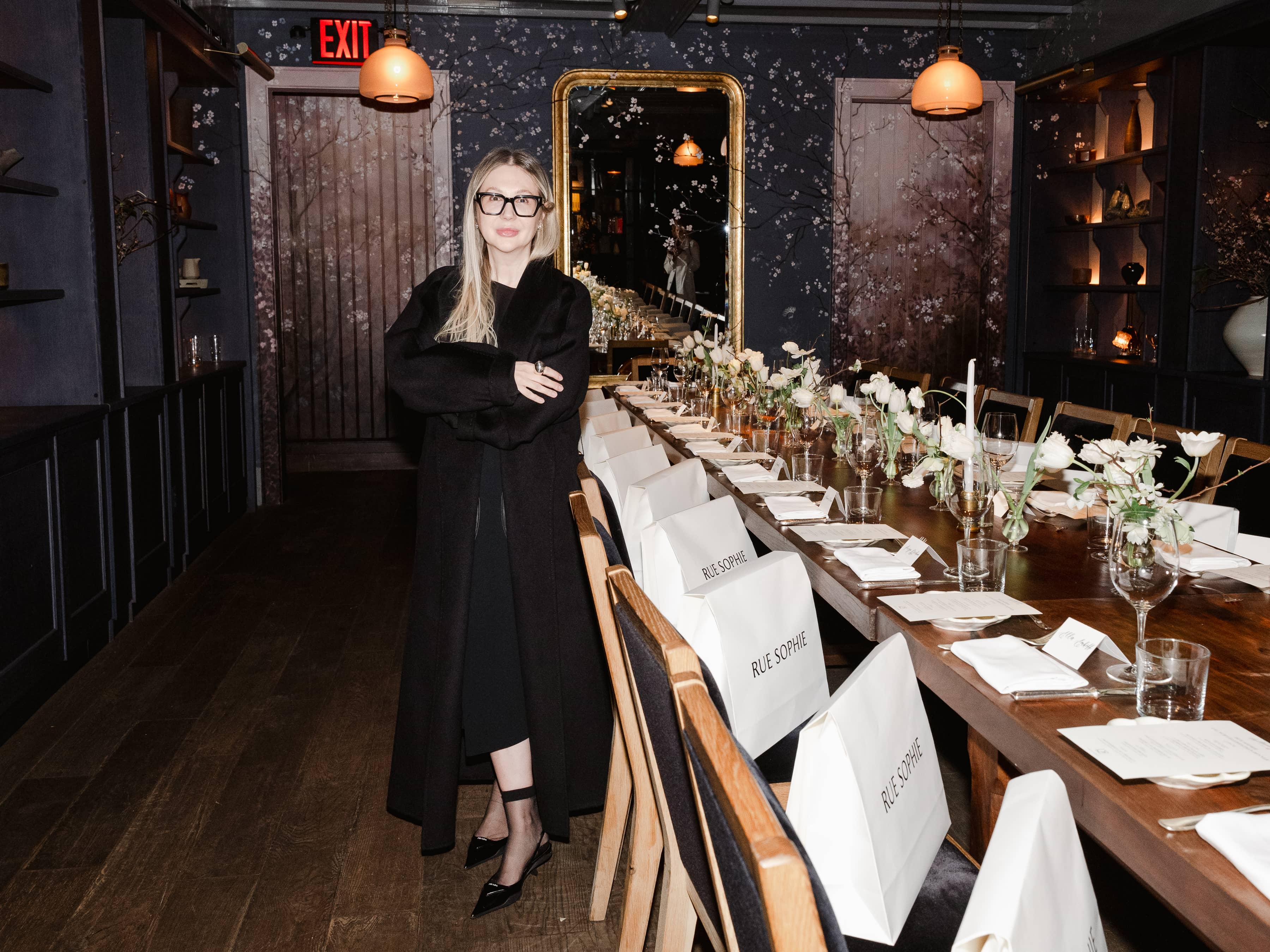 MVPR client dinner event with Rue Sophie, guests seated at a candlelit table setting