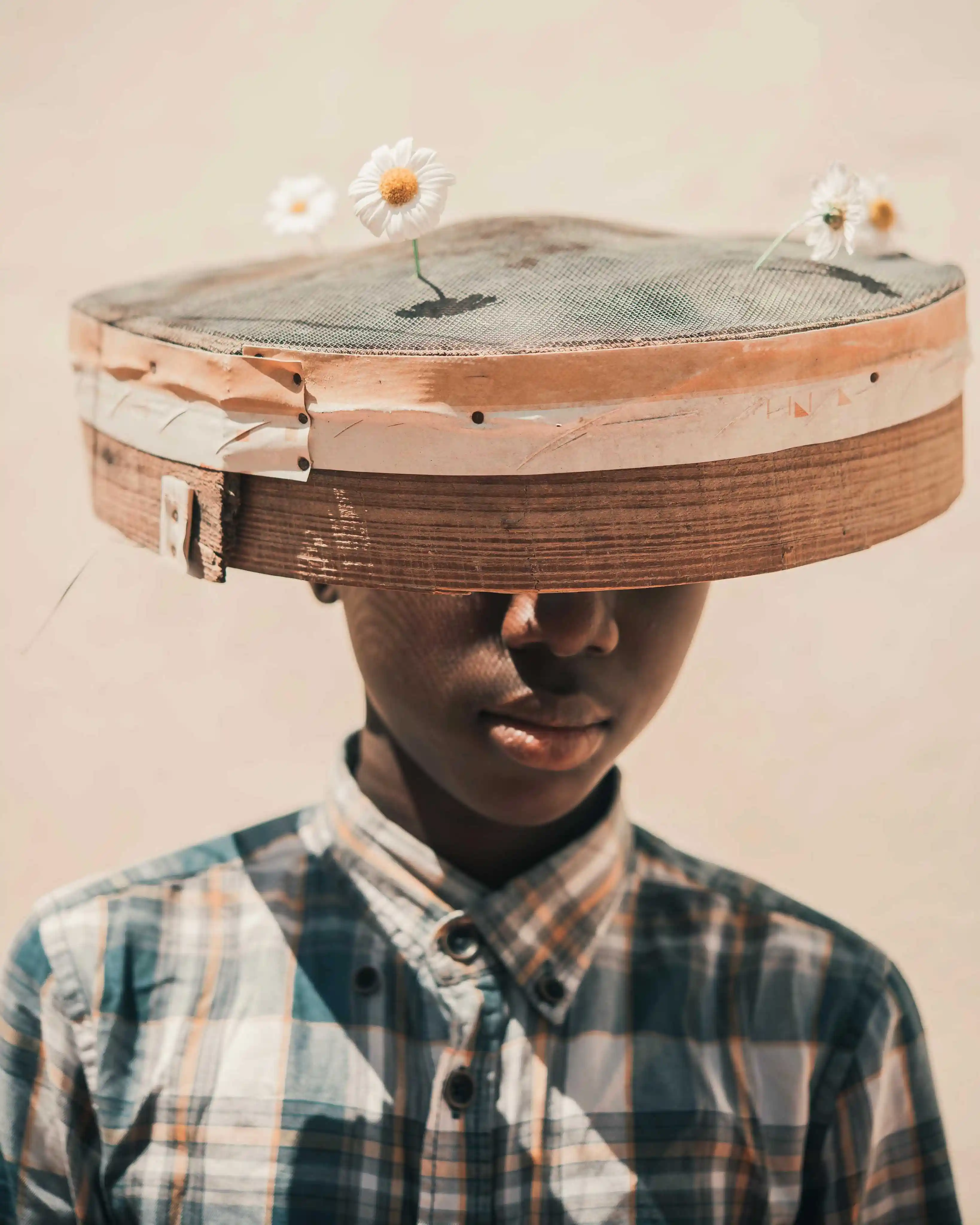 Kobu Studio - A man wearing unique headwear demonstrating our work