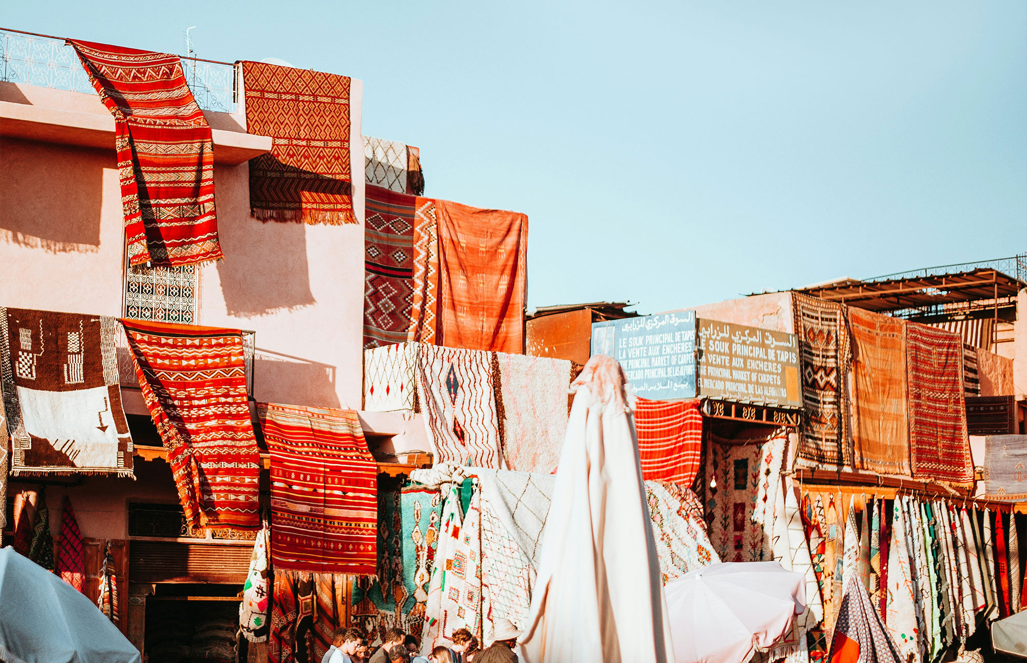 The tops of buildings with vibrant rugs in Pakistan