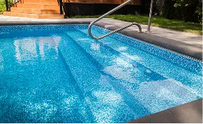 Vinyl liner pool with built-in steps and stainless steel handrail