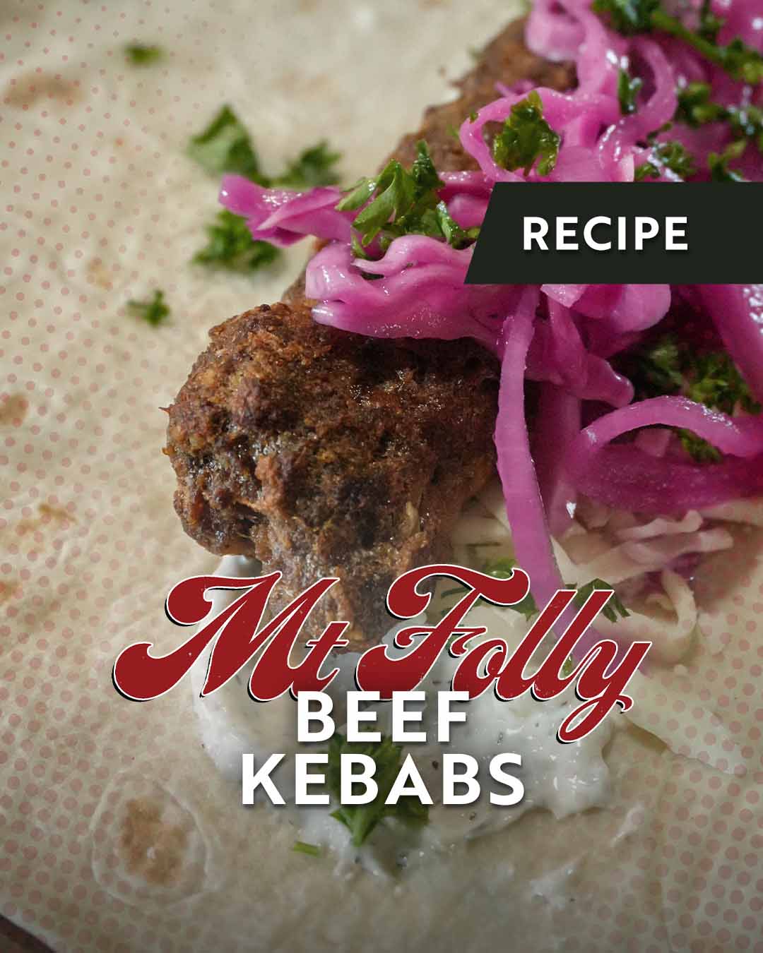 Close-up of a Mediterranean-style beef kebab made with Mt. Folly pasture-raised beef, served on a tortilla wrap with vibrant pink pickled onions, fresh parsley, and tzatziki sauce in Winchester, Kentucky.