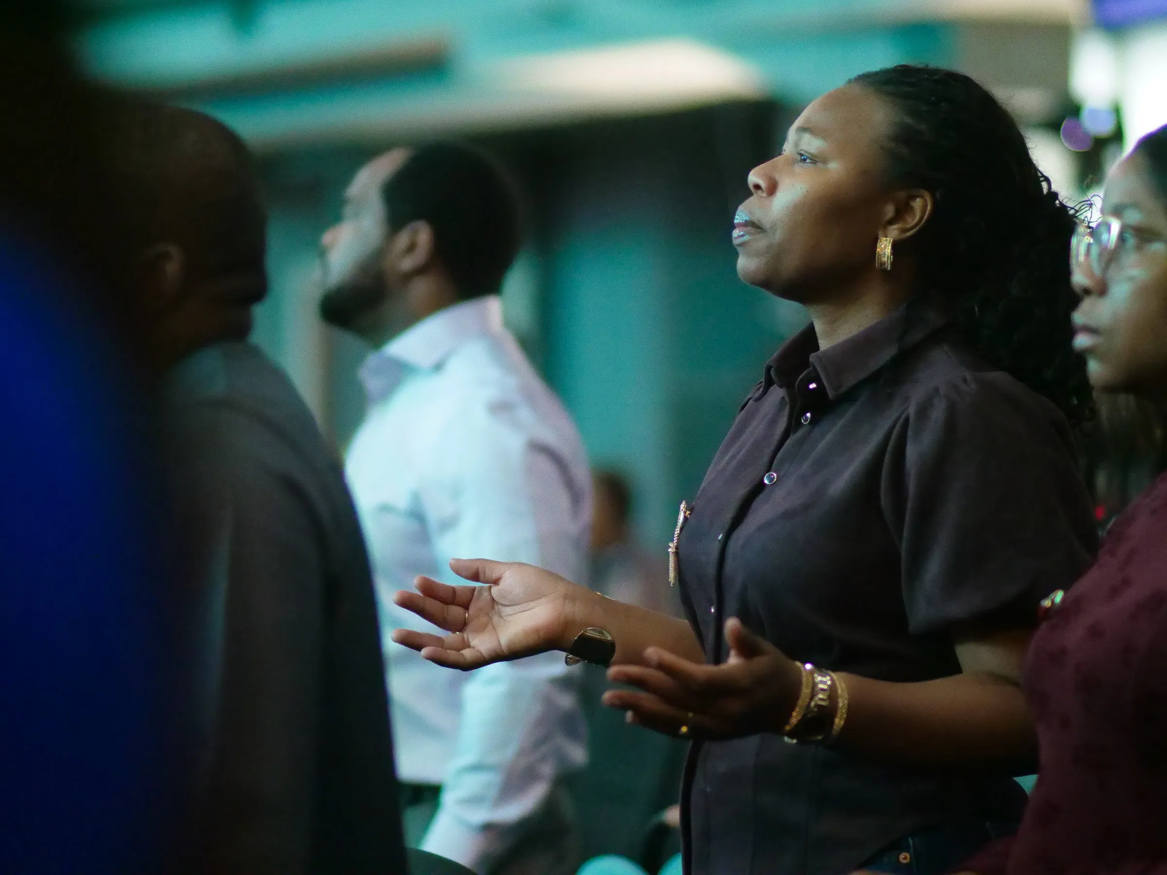 A member praying during service