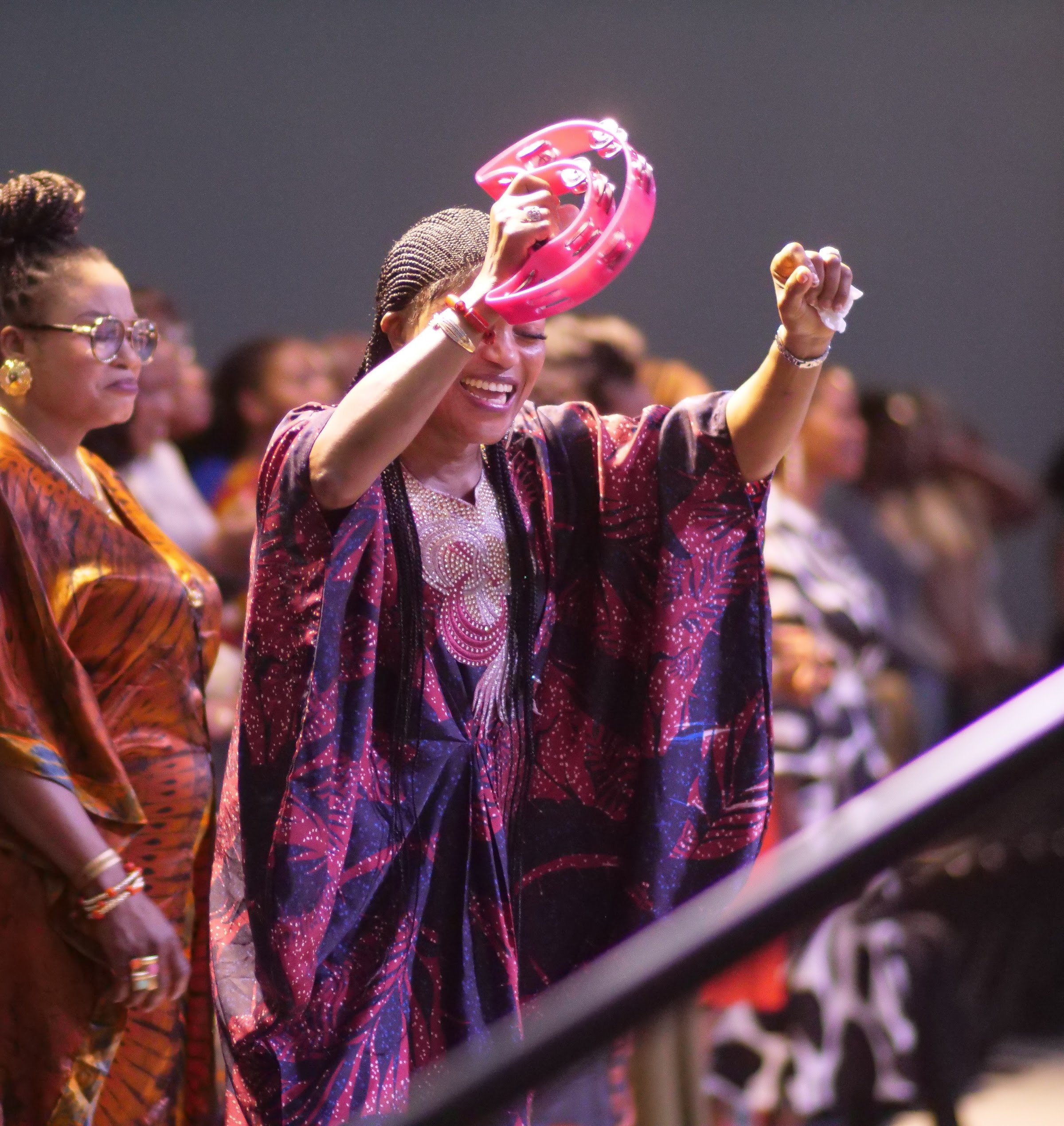 A woman praising God in worship
