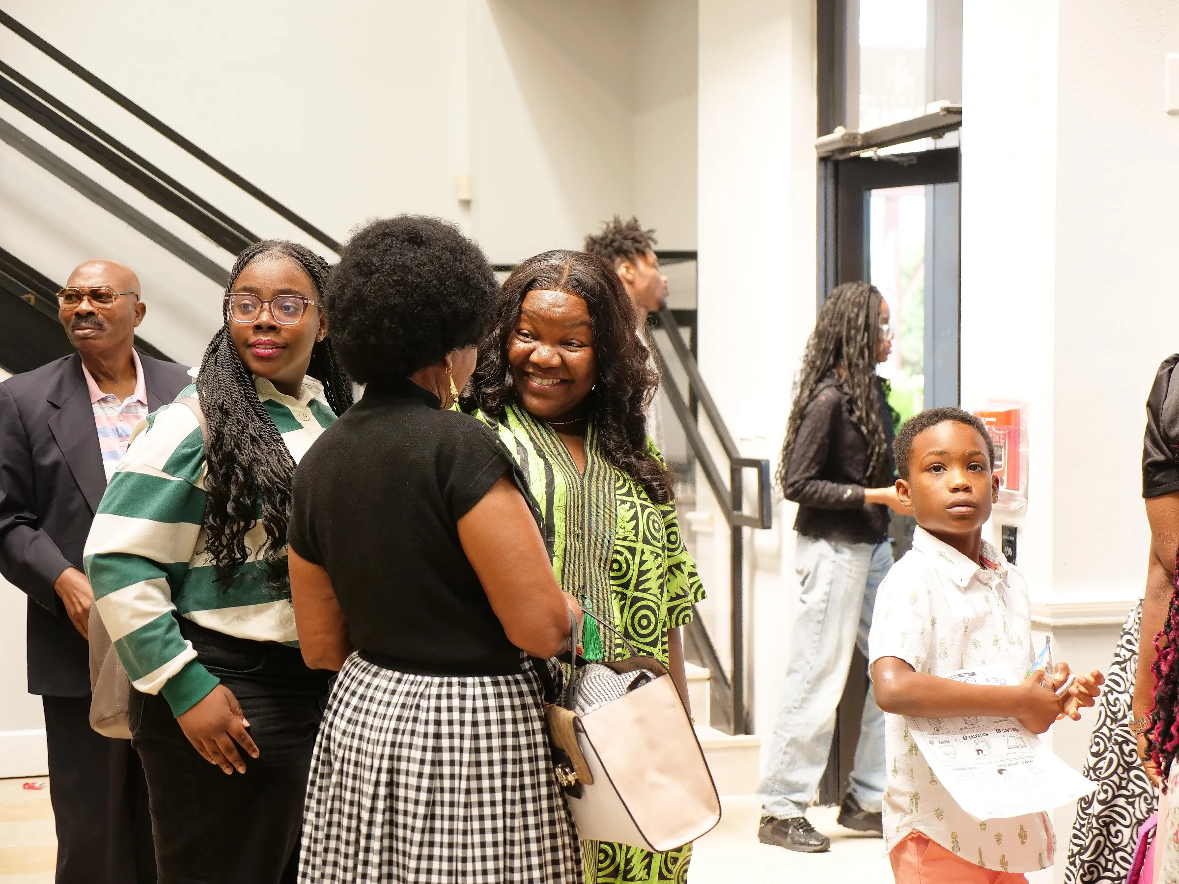 Young people of Living Word Chapel in the lobby
