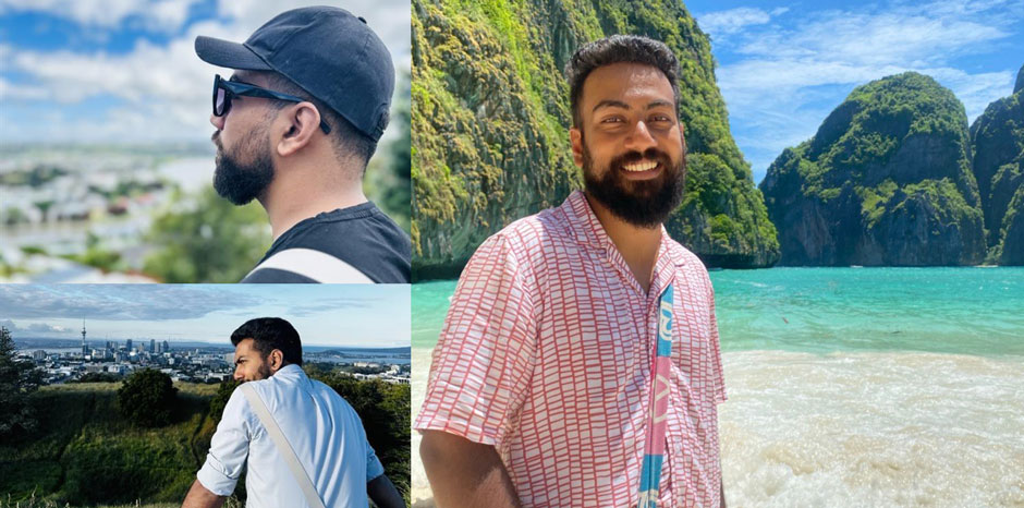 A group of students pose together in school uniforms and hoodies, holding a shield on their final day.