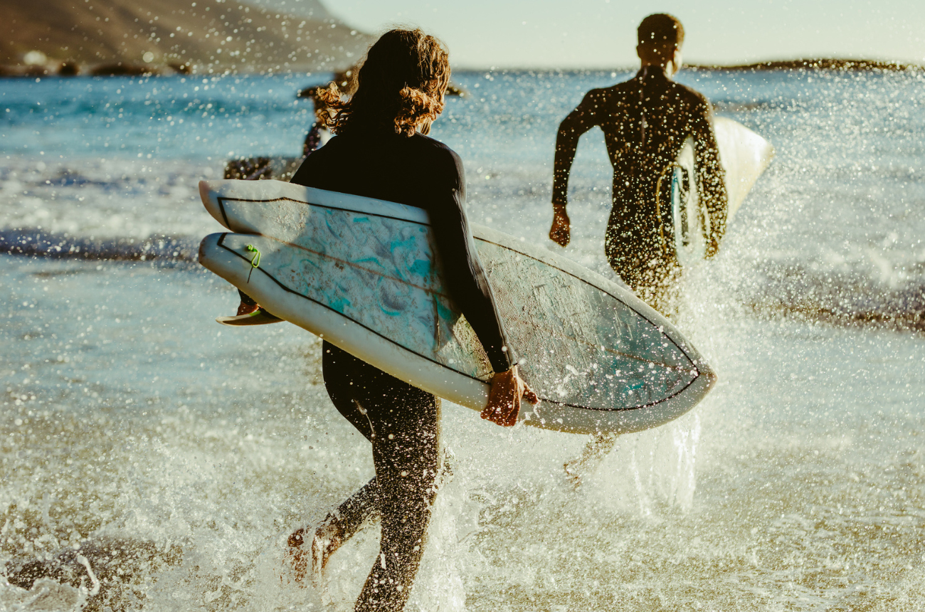 Best Beaches for Surfing Near Hollywood CA - Group of people surfing