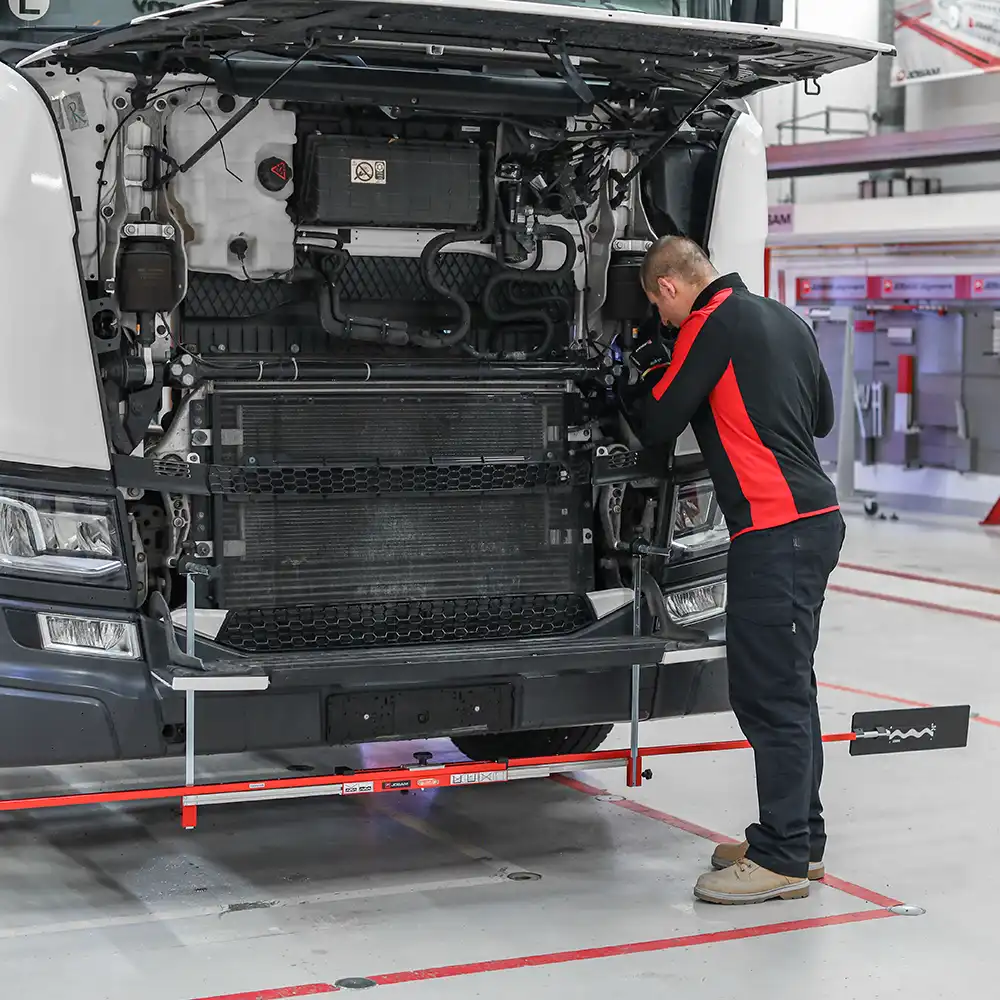 How often should I carry out wheel alignment on a commercial vehicle?