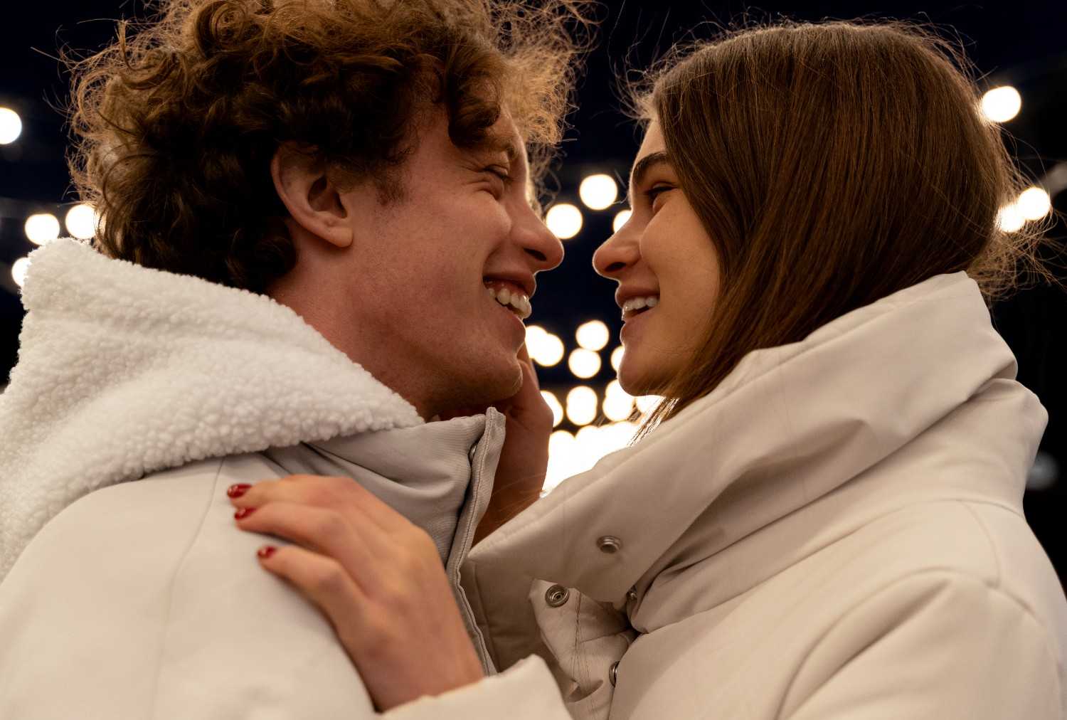 Romantic couple outdoors night during Cuffing Season