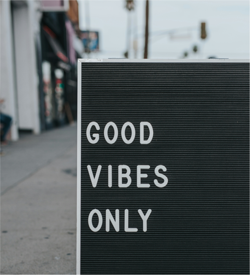 A street sign which says good vibes only