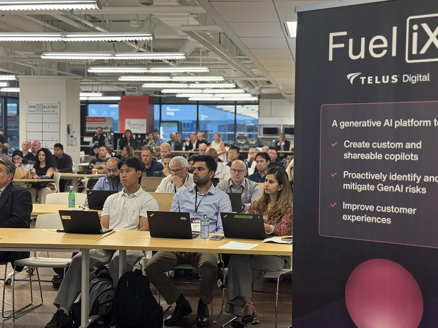 AI Ignition Toronto attendees learning practical AI strategies from Fuel iX and TELUS Digital experts.