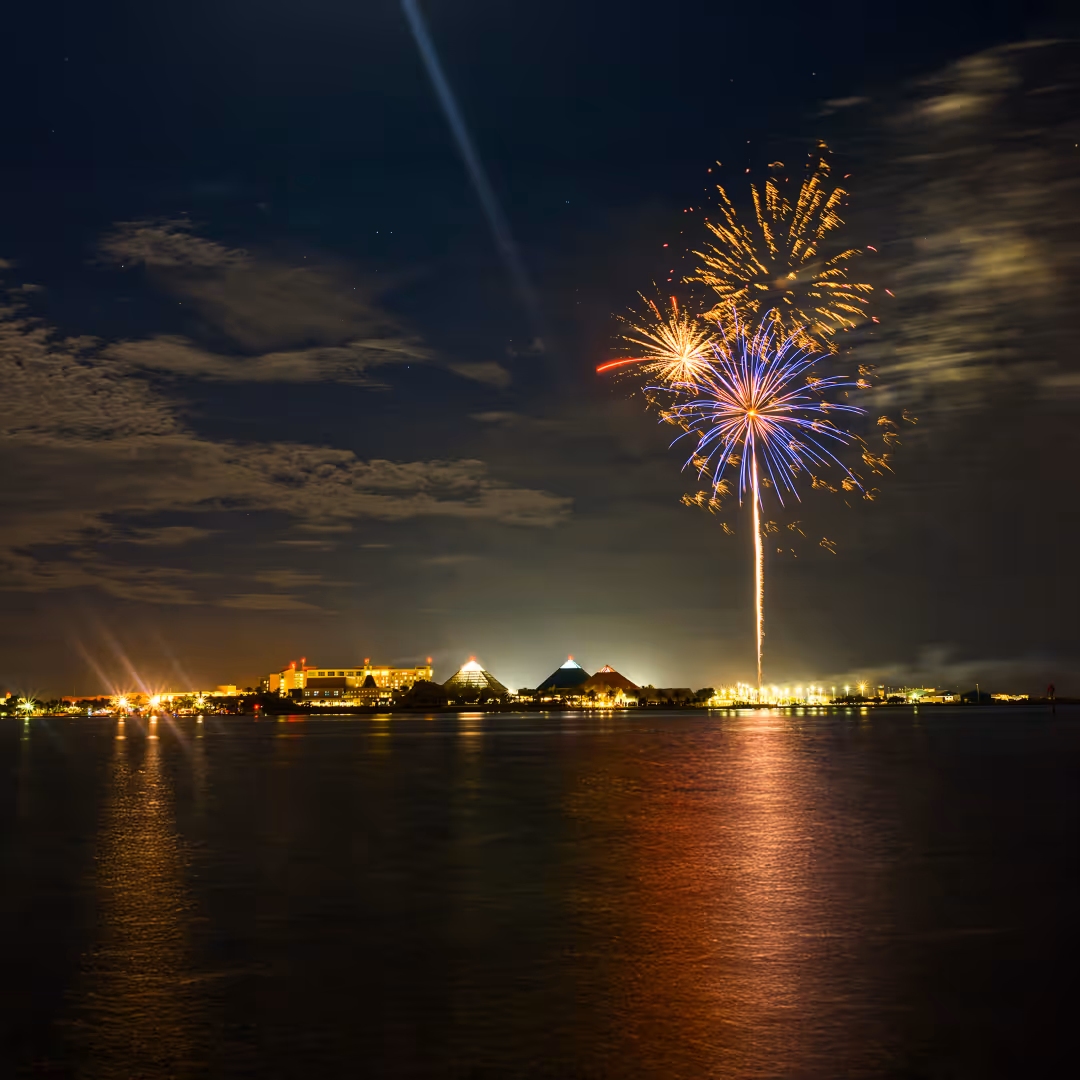 Fireworks exploding in the sky over Offats Bayou in Galveston, Texas