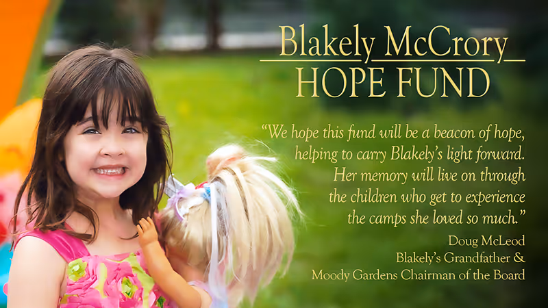 The image shows a young girl with a bright, cheerful expression, set against a backdrop of lush greenery and a text overlay about the Blakely McCrory Hope Fund.
