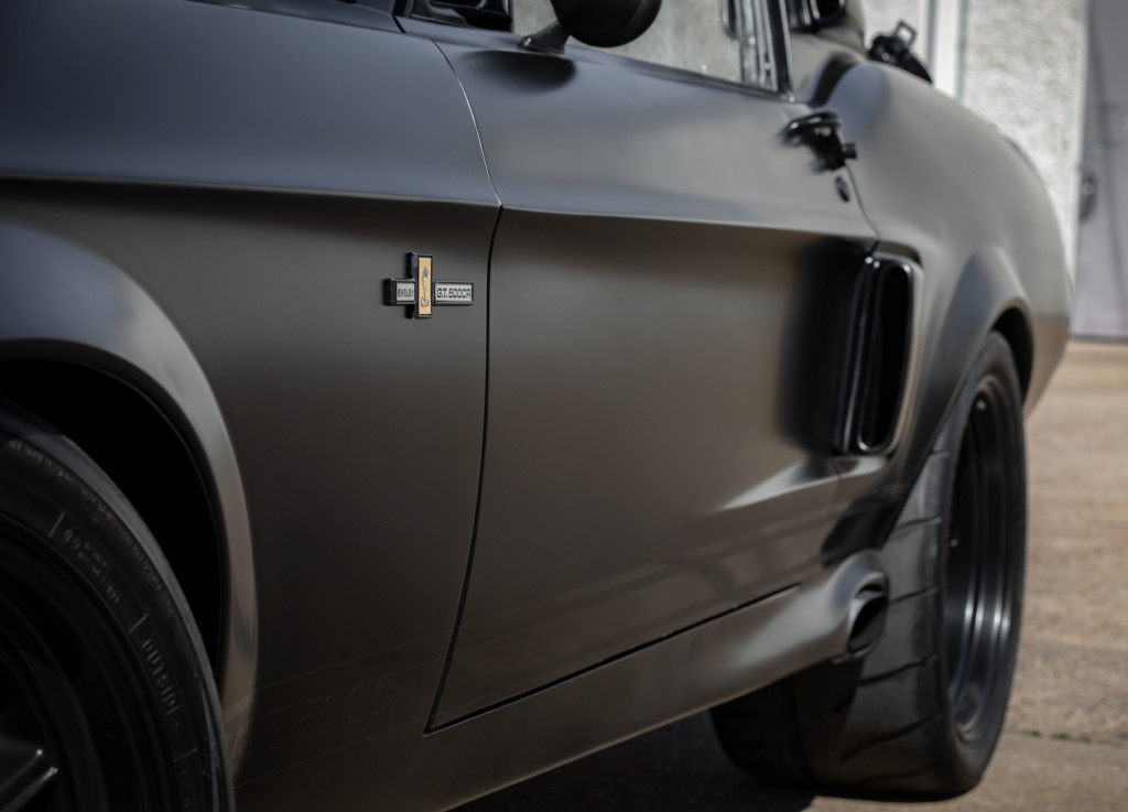 1967 Shelby GT500CR 900S flat black with black stripes built by Classic Recreations badge and side exhaust