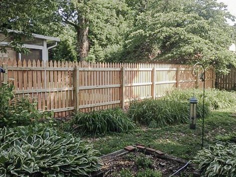 Interior rails and posts along the cedar garden fence in Midway.
