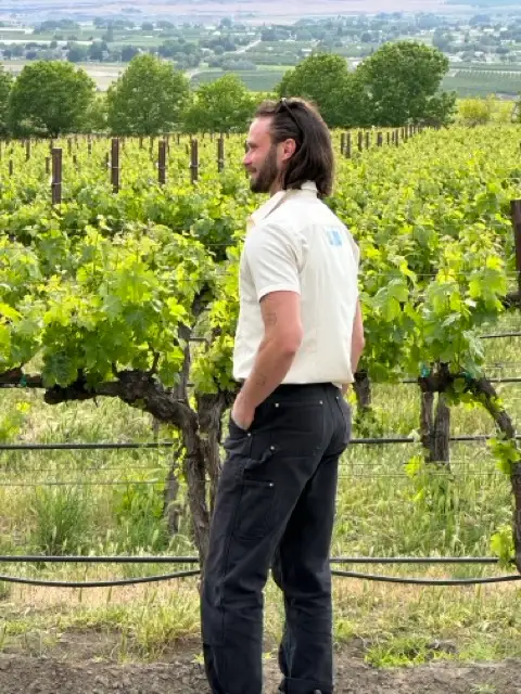 Aaron Gratch at Scooteney Flats Vineyard – inspecting Red Mountain Malbec vines for Cellar Beast's award-winning 2022 Reserve release
