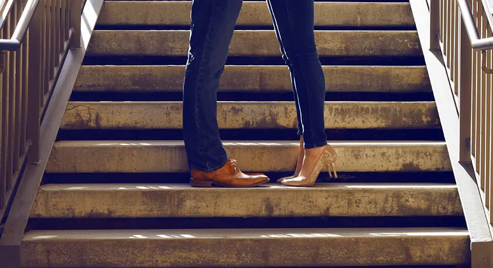 Close up of legs of couple facing one another
