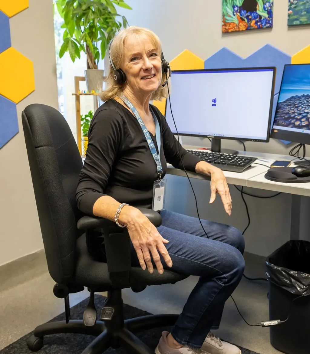 Staff working in office ready to support