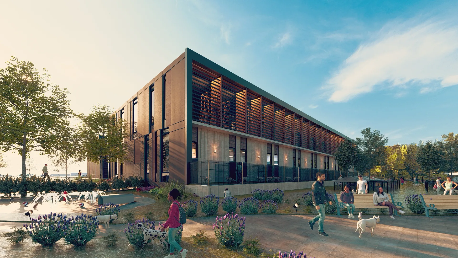 Modern building beside a park with walking paths, benches, fountain, trees, and people walking dogs.