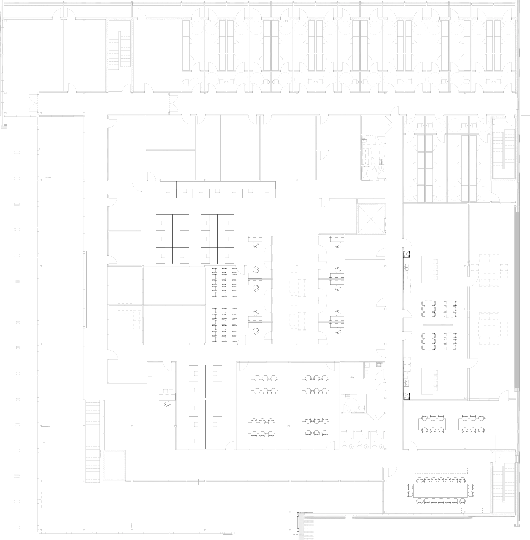 Architectural floor plan showing a layout with multiple rooms, corridors, and furniture arrangements.
