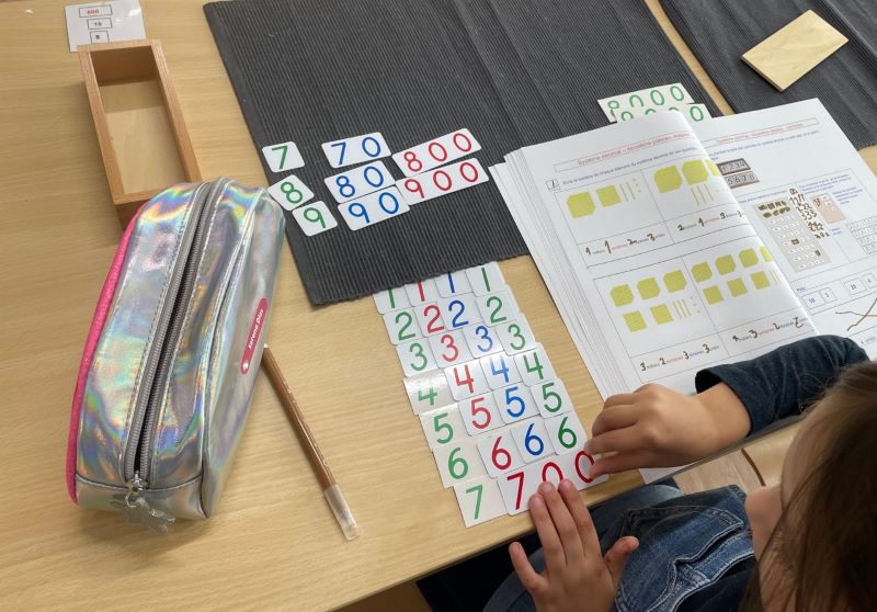 Individualized support at school with concrete materials and specific work plans, enabling students to progress at their own pace.