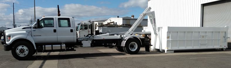 Western Cascade Container white rect box with sideboards on a Stellar Hooklift 138-18-20 in custom white paint