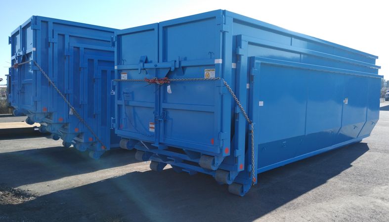 Western Cascade Container blue stack of Nestable semi-tub boxes for small Hooklift secured for shipping
