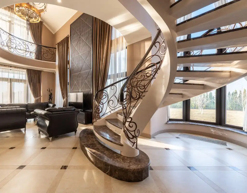 a modern living room with a spiral staircase
