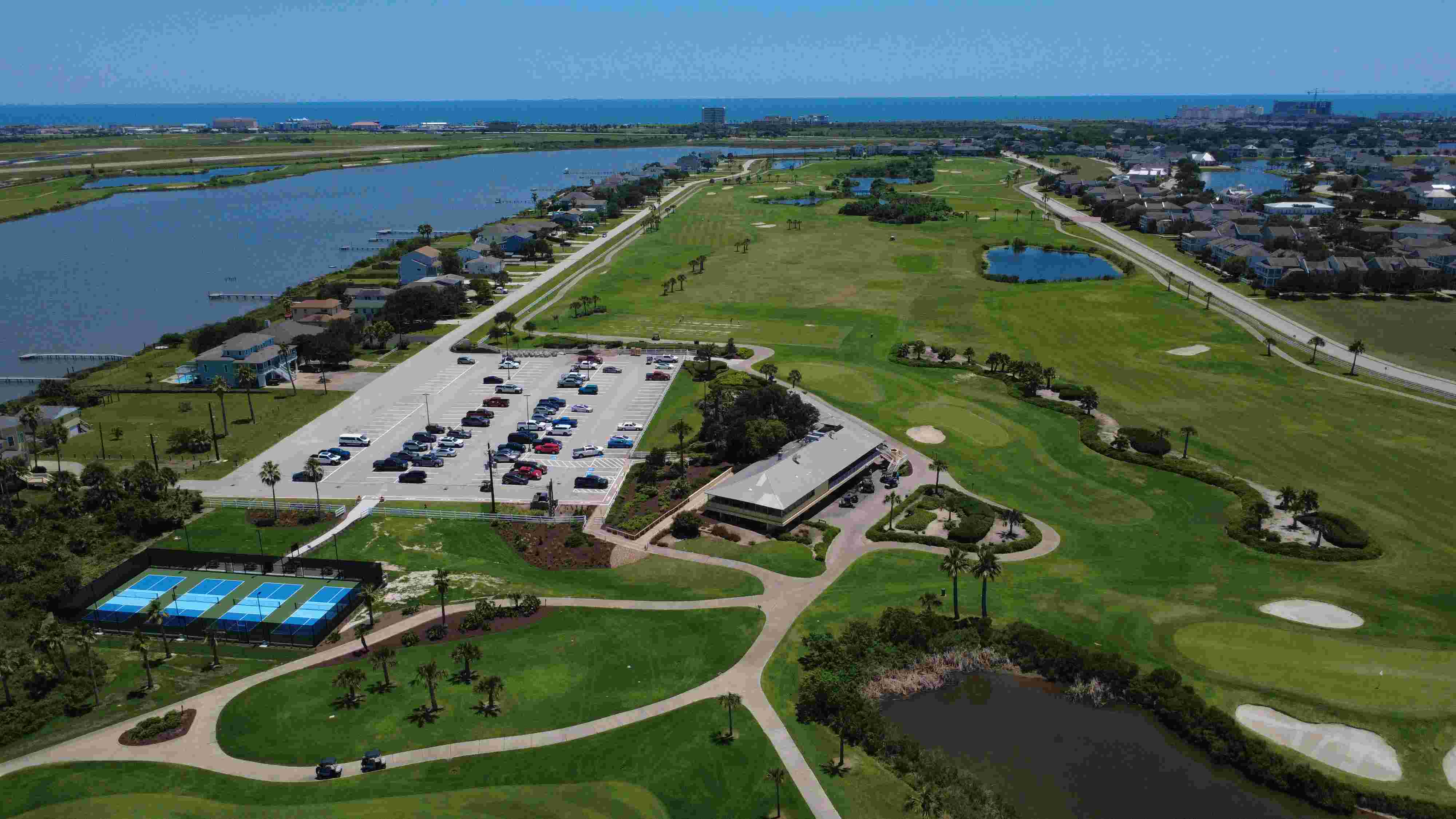 Moody Gardens logo on a green to cyan gradient, Galveston, Texas