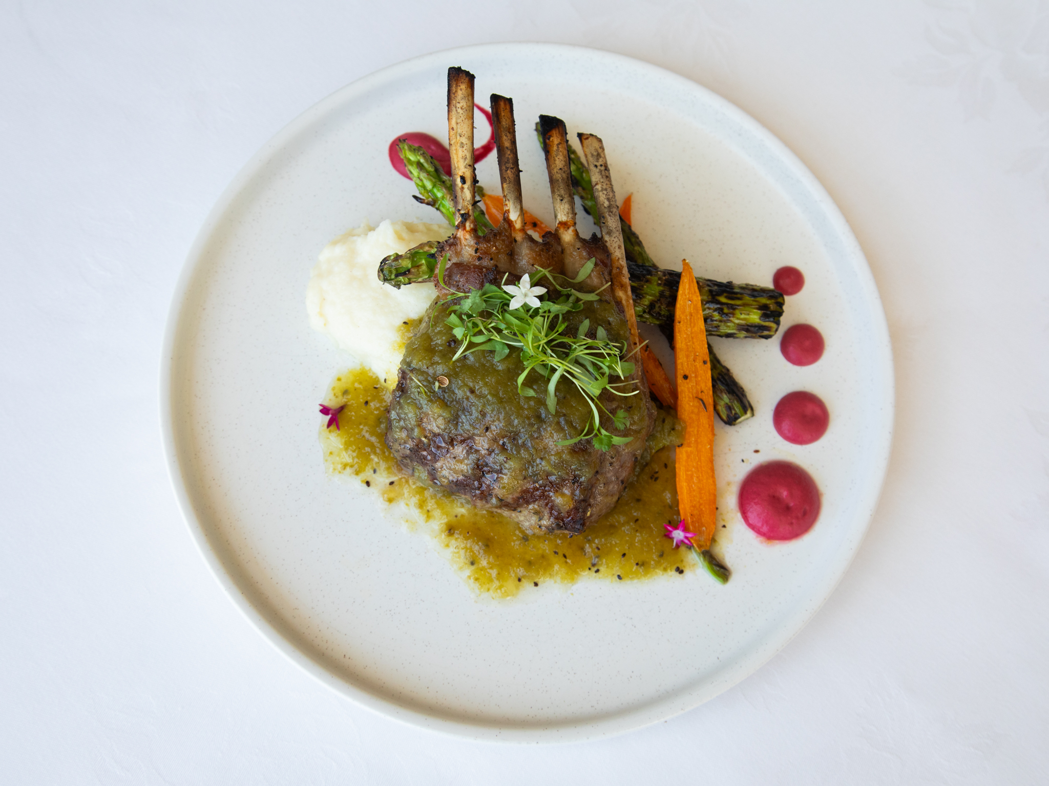 Rack of lamb with grilled asparagus and carrots at Shearn's