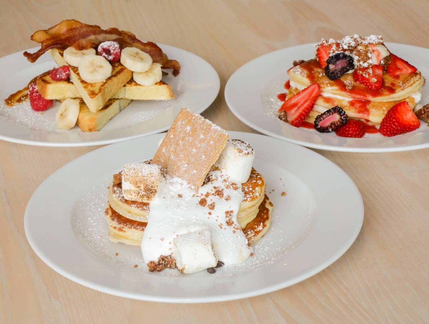 Pancakes and French toast topped with fruit for breakfast at Café in the Park