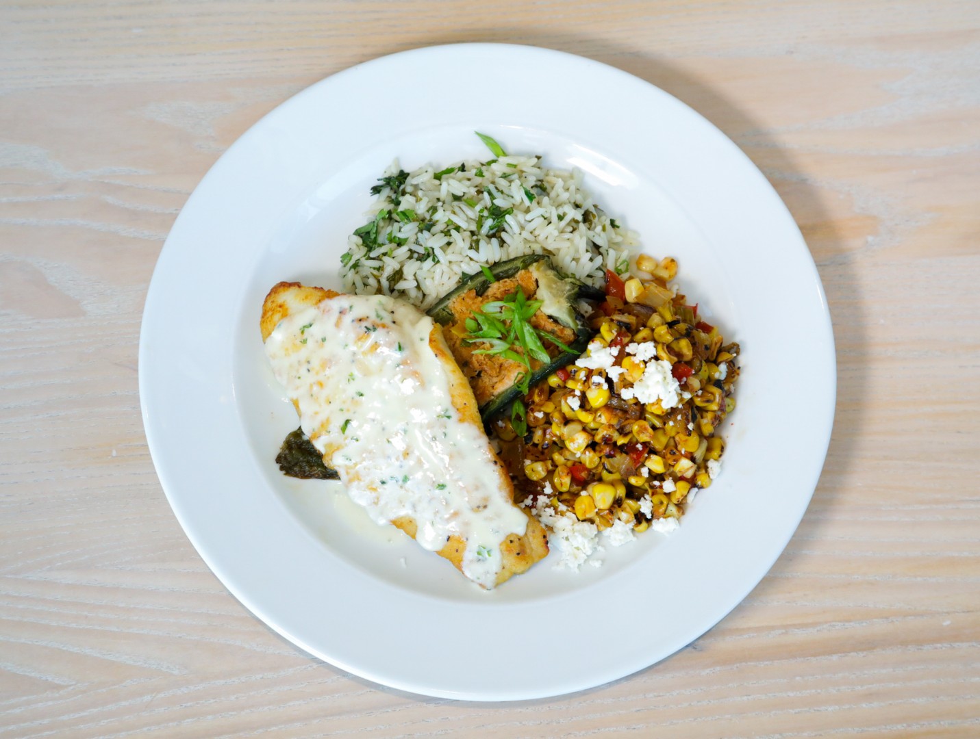 Fish entree with rice and corn salad at Café in the Park
