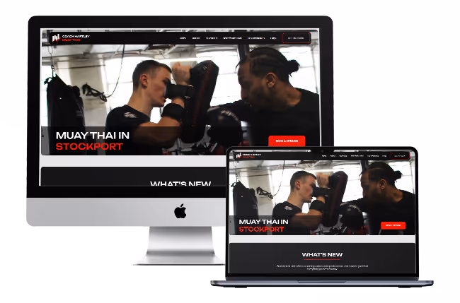 Image of client website shown on a monitor and a laptop.