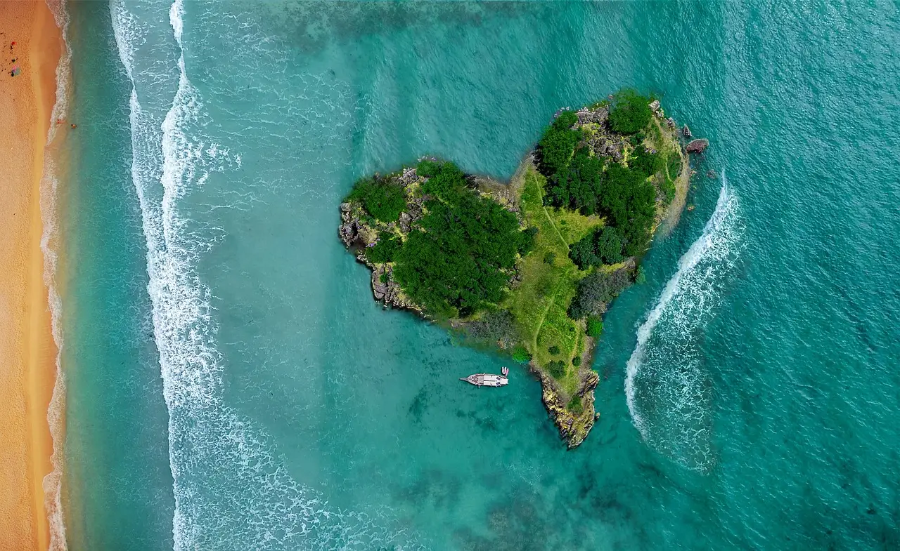 a heart shaped island in the middle of the ocean