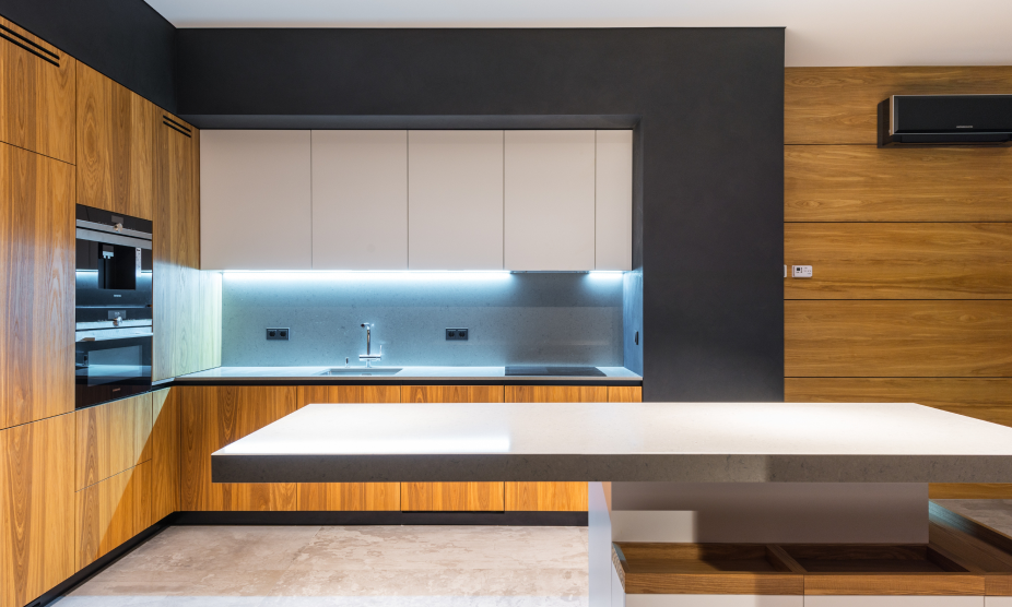 a kitchen with wooden cabinets