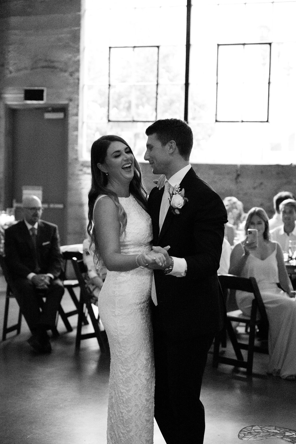 Newlyweds during their first dance to live wedding music