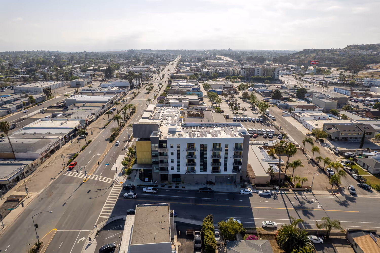 92.22kW solar panel system powering a commercial multi-family housing complex in San Diego, designed by TENCO SOLAR.