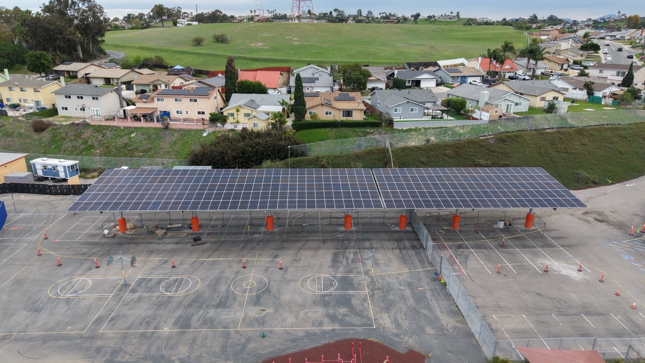 Aerial shot of a solar carport at a school