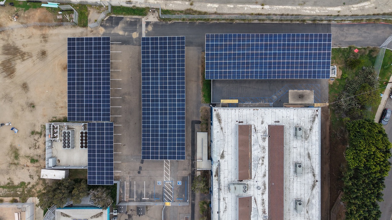 Drone aerial image of solar carport installation at Montgomery Middle School as part of a DSA commercial solar project.