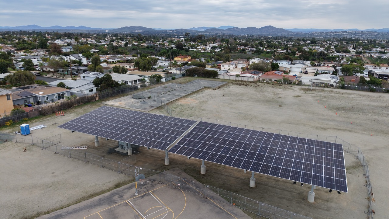Drone aerial image of solar carport installation at Jones Elementary School, part of an SDUSD commercial solar for schools program.