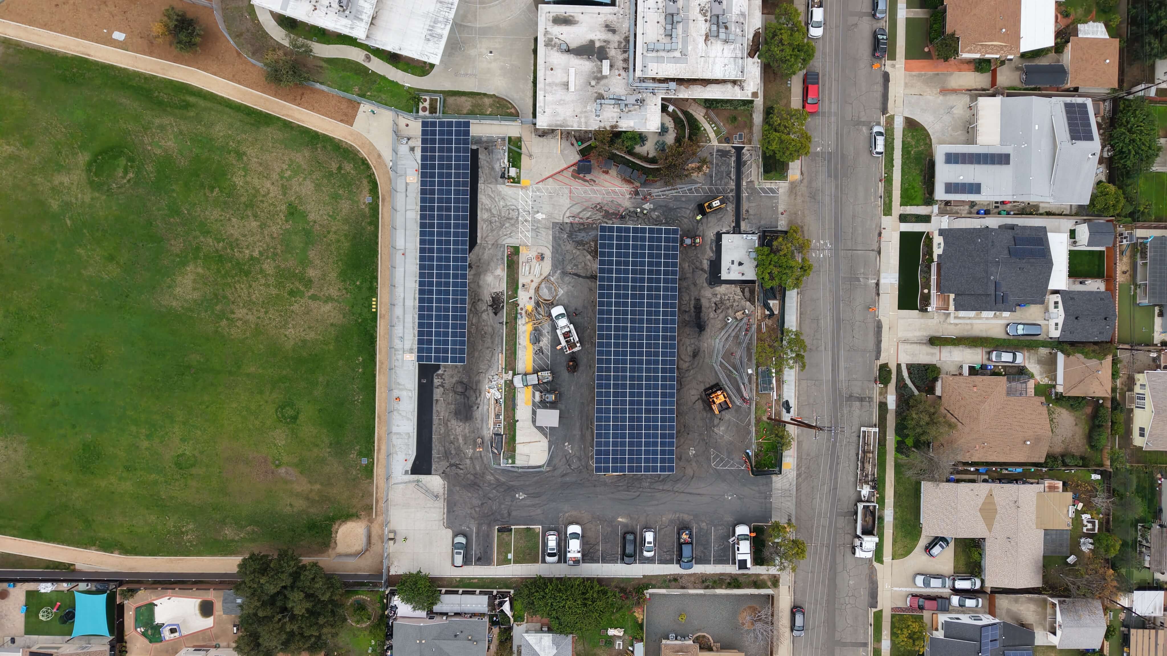 Aerial drone image of commercial solar installation at Marvin Elementary School featuring solar carports for SDUSD.