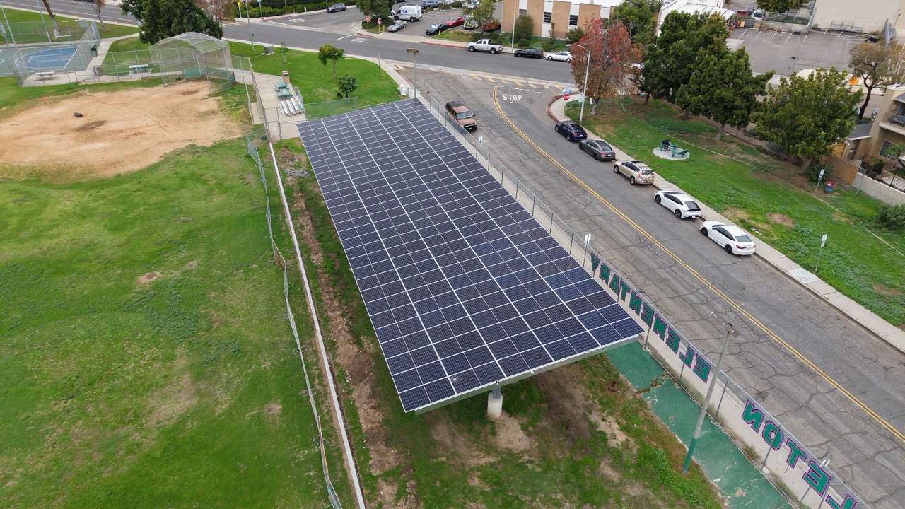 Drone aerial image of solar carport installation at Pendleton Elementary School, part of a DSA commercial solar project for SDUSD.