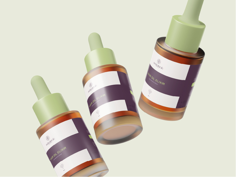Three amber glass bottles with green dropper caps, labeled Hair Oil Elixir, floating against a light green background.