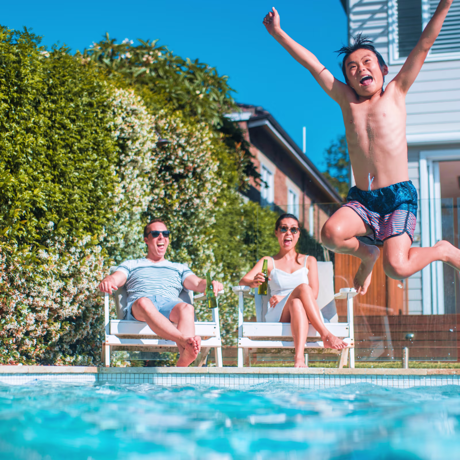 a family swimming at a pool at a Swimply rental by the hour at a Swimply swimming pool listing