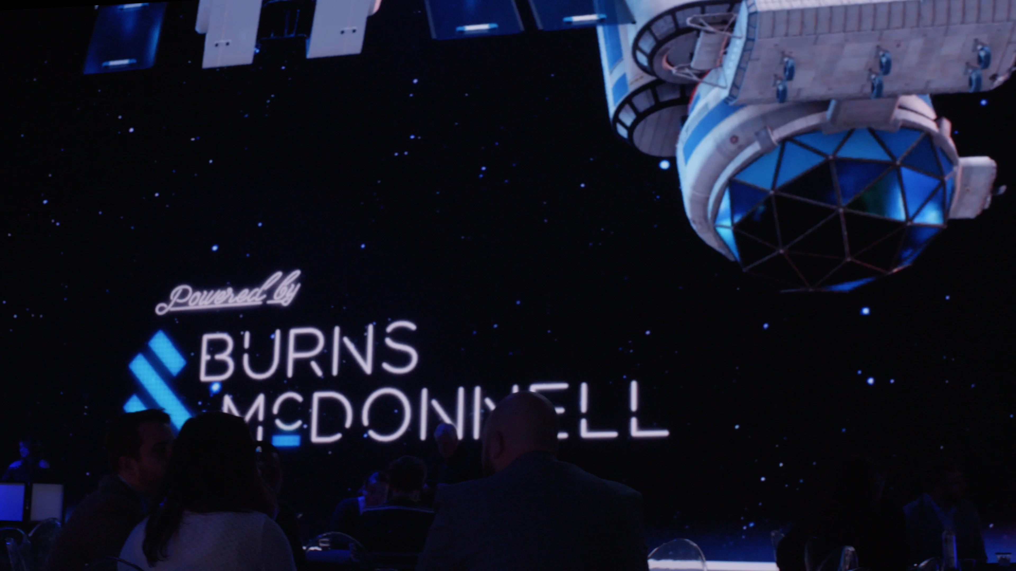 Imprint's 18K wraparound immersive screen displays the Burns McDonnell brand at Distributech