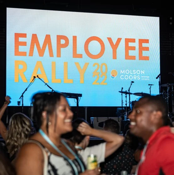 Attendees celebrate at Imprint's Employee Rally production for the Molson Coors Distributor Convention