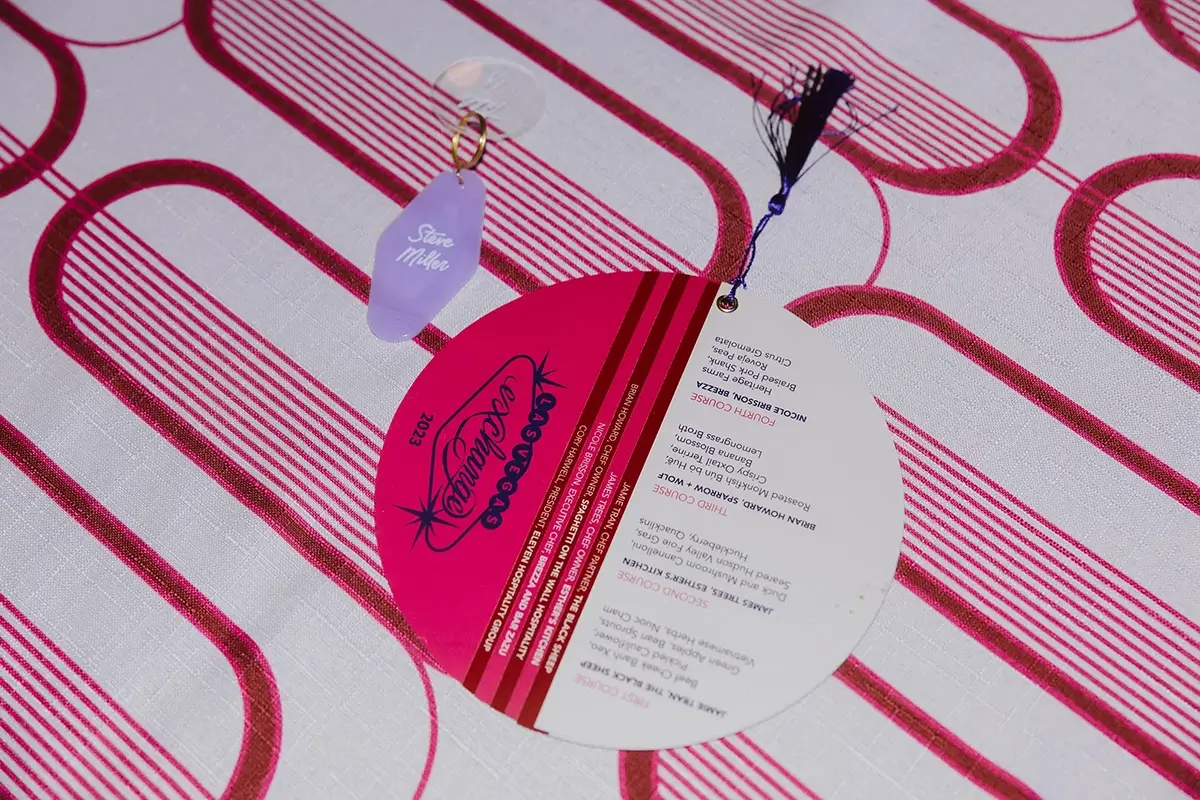 A custom menu card designed by Imprint for Maxwell Leadership's five-course dinner