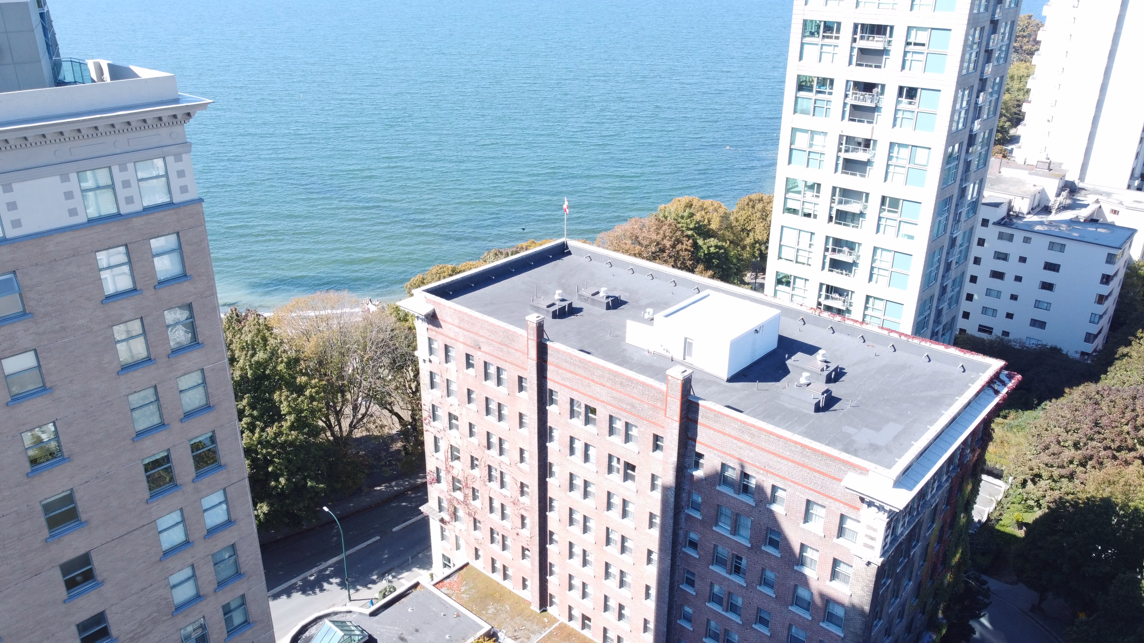 Aerial drone inspection of a commercial flat roof on the Vancouver waterfront